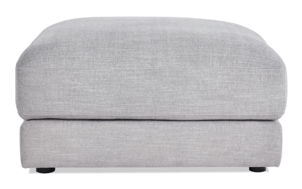 Gravity Gray Square Ottoman with contemporary design, gray polyester fabric upholstery, plush Bob-O-Pedic® feather blend topper, part of Gravity collection.