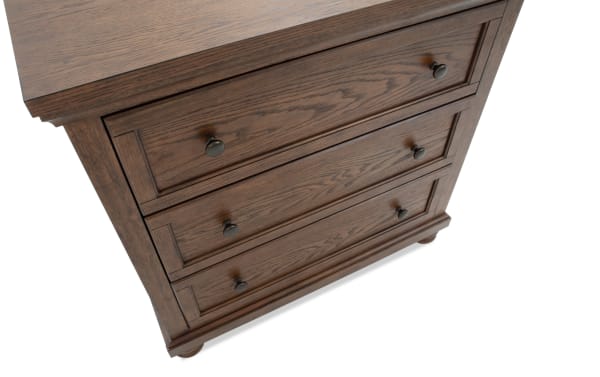 Traditional Portland Brown 3 Drawer Chest with dark oak veneers, rubberwood solids, and metal knobs, featuring a classic wood grain finish.