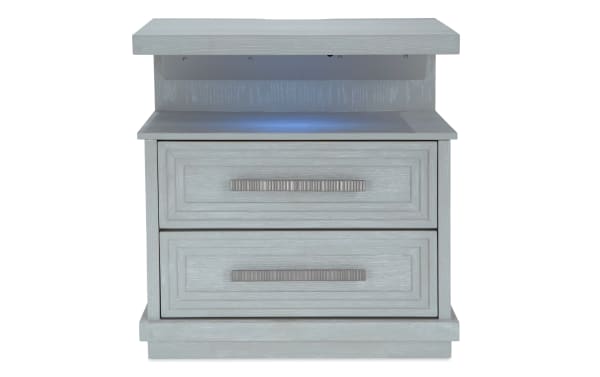 Infinity White 2 Drawer Nightstand in contemporary style, made of white MDF with cedar-lined bottom drawer, felt-lined top drawer, LED lighting, and USB ports.