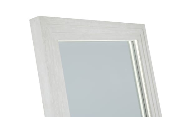 Rectangular mirror with a wide, textured white wooden frame, featuring a modern, clean design suitable for home decor.