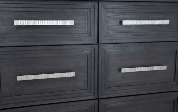Contemporary Infinity Charcoal 9 Drawer Dresser in MDF with charcoal wood grain finish, sleek silver ribbed handles, and framed drawer fronts.