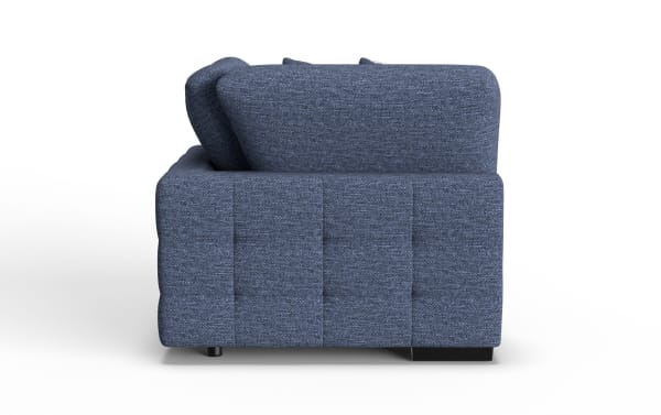Blue fabric sofa side view showing textured upholstery, cushioned armrest, and modern block feet design, suitable for living room seating.