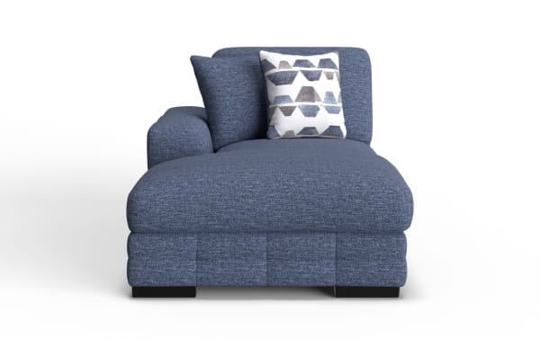 Blue upholstered chaise lounge with textured fabric, featuring a geometric patterned throw pillow and cushioned armrest, modern style seating.