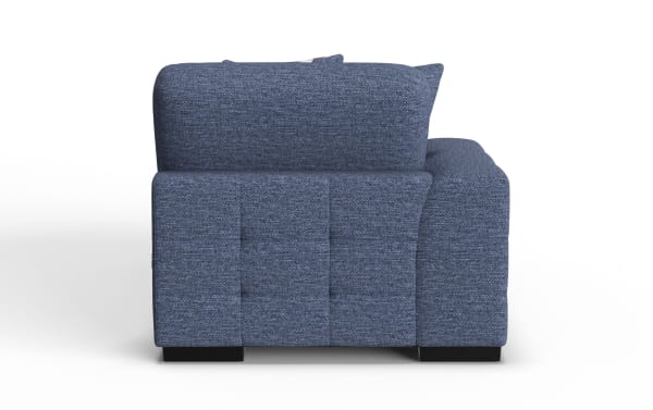 Blue fabric sectional sofa with tufted back cushions and wide armrest, featuring a modern design and black block feet.