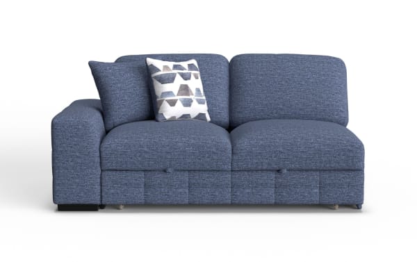 Blue fabric sectional sofa with a left armrest, two seat cushions, and two back cushions, featuring a decorative white and blue geometric throw pillow.