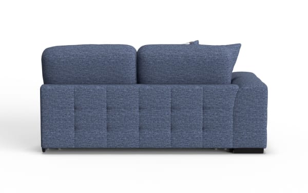 Modern blue fabric sectional sofa with plush cushions and a clean, tufted back design, ideal for contemporary living rooms.