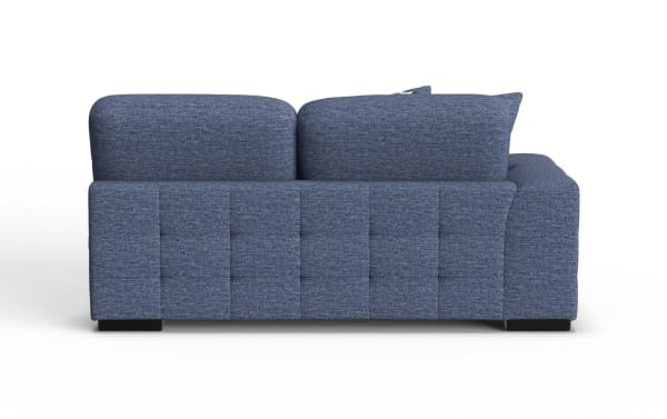 Modern navy blue fabric sectional sofa with plush cushions, low black legs, and a clean, contemporary design shown from the back.