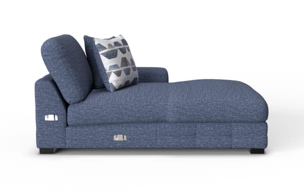Blue fabric chaise lounge with textured upholstery, adjustable backrest, and patterned accent pillow, featuring metal hardware details.
