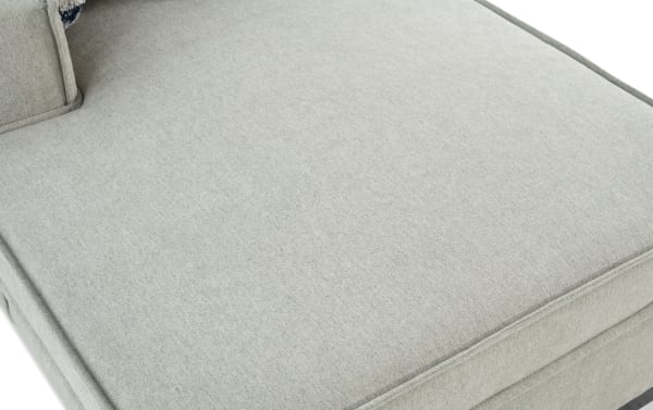 Gray polyester fabric upholstery on the Playmax Gray Left Arm Facing Storage Chaise with USB and USB-C ports, featuring transitional style and memory foam seating.