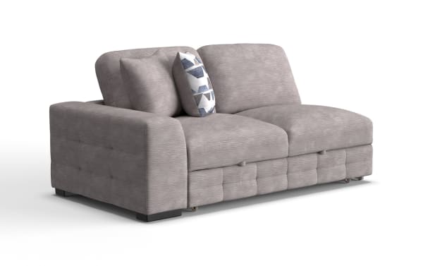 Modern gray fabric loveseat with plush cushions and a patterned accent pillow, featuring a tufted base and low black legs.