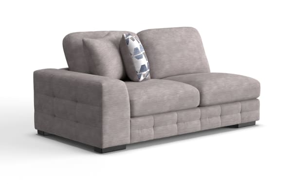 Modern gray fabric loveseat with plush cushions, tufted sides, and a decorative blue and white accent pillow, ideal for contemporary living rooms.