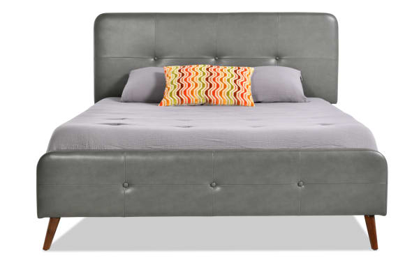 Bettie Twin Charcoal Faux Leather Upholstered Platform Bed in mid-century modern style with tufted headboard and footboard, gray vinyl upholstery, and tapered wooden legs.