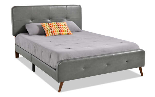Bettie Twin Charcoal Faux Leather Upholstered Platform Bed with mid-century modern design, tufted headboard, footboard, and tapered wood legs.