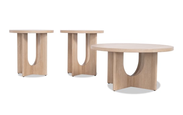 Cascade Light Brown Round Coffee and 2 End Table Set from Cascade Entertainment & Occasional collection, featuring contemporary MDF design with unique U-shaped supports and light brown finish for stylish living room functionality.