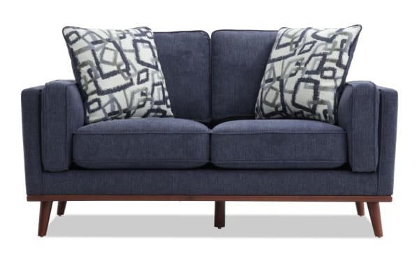Tribeca Navy 66'' Loveseat in blue polyester fabric with mid-century modern design, memory foam cushions, and geometric accent pillows.