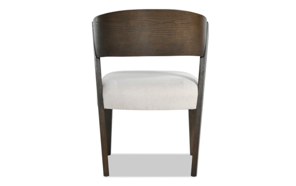 Contemporary Luxe Dining chair with white polyester fabric seat, brown rubberwood panel back, and oak veneer frame, memory foam padded.