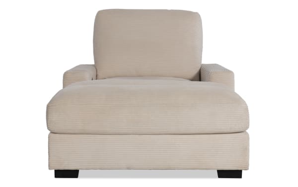 Beige Aspen Power Reclining Chaise in plush polyester fabric with cushioned seat, transitional style, and USB/USB-C ports for convenient charging.