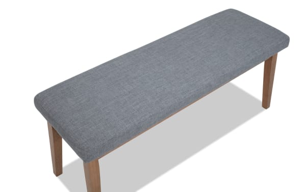 Transitional Elm Dining Bench with light gray polyester fabric upholstery, foam padding, and natural wood MDF legs, ideal for dining seating.