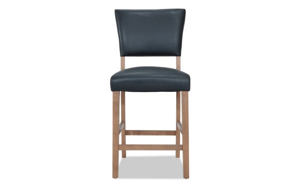 Elm Natural & Gray faux leather upholstered counter height stool with panel back, foam padding, and natural wood legs from Elm Dining collection.