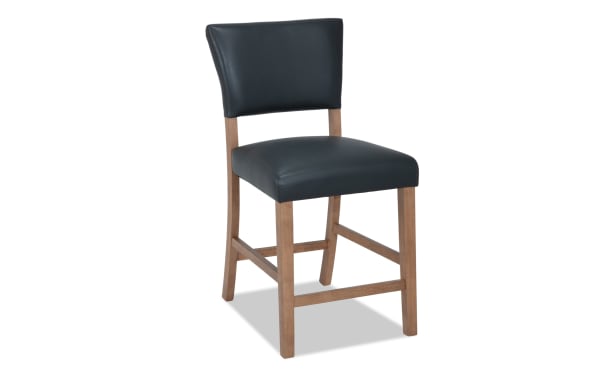 Transitional Elm Dining counter height stool with gray foam-filled faux leather upholstery, MDF frame, and natural wood legs for kitchen or bar seating.