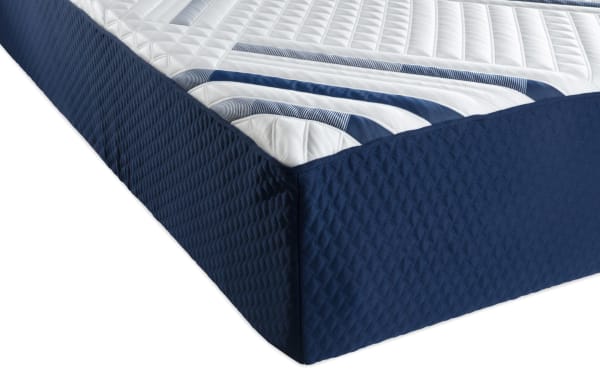 Signature Hybrid 13.5'' Queen Plush Mattress with quilted white top and navy blue textured sides, featuring cooling cover and gel memory foam layers for plush comfort.