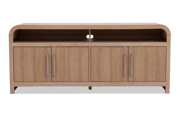 Cascade 60'' natural MDF transitional TV stand with fully assembled frame, ribbed cabinet doors, metal handles, storage, and cord management.