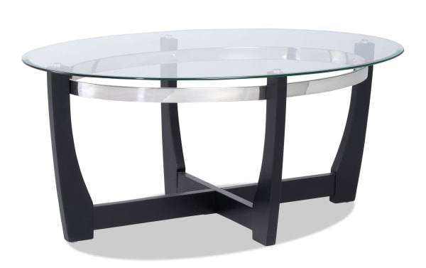 Mirage Black Oval Coffee Table with tempered glass top, black birch veneer curved legs, and metal accents from Mirage Entertainment & Occasional collection.