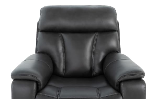 Black leather transitional Showcase power recliner with plush padded armrests, headrest, and stitched upholstery, designed for immersive audio comfort.