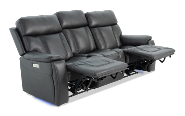 Showcase Black Leather 89'' Immersive Audio Power Reclining Sofa with transitional style, black leather upholstery, power recline, headrests, and extended footrests.