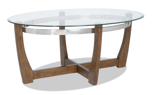 Mirage Brown Oval Coffee Table with tempered glass top, birch veneer curved legs, and metal accents from Mirage Entertainment & Occasional collection.