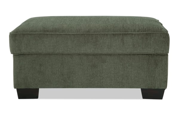 Brynn Green Storage Ottoman in soft green polyester fabric with cushioned top and hidden storage, from the Brynn transitional collection.