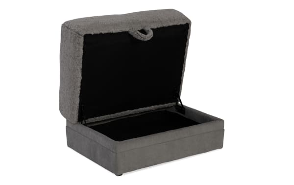 Lynx Gray Storage Ottoman in transitional style with plush gray polyester fabric, featuring hinged top revealing hidden storage space.