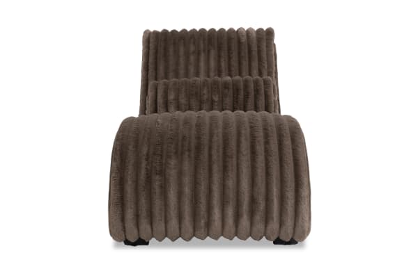 Modern chaise lounge chair upholstered in soft, ribbed brown faux fur fabric with a curved, cushioned design for comfortable seating.