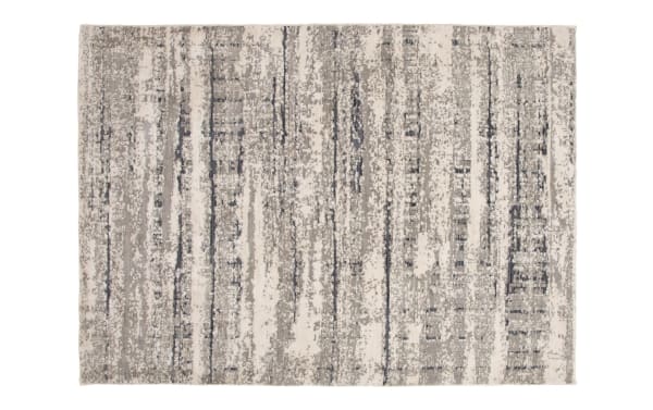 Dove 5' x 7' gray abstract rug with transitional style, made of soft polyester fabric, featuring a neutral, textured pattern ideal for living spaces.