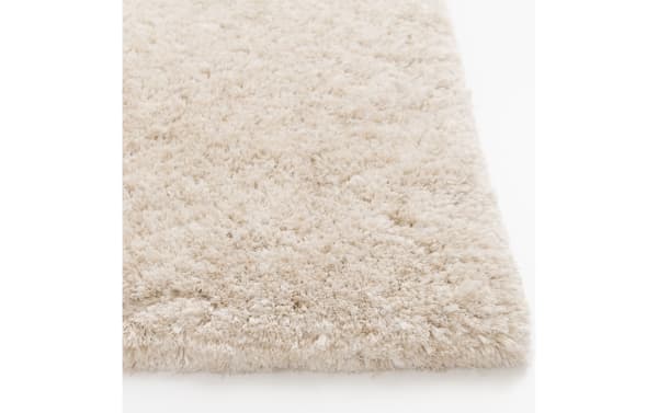 Cream solid shag rug from Sherpa collection, 8' x 10', ultra-plush polyester fabric with thick, soft pile in transitional style.