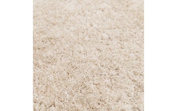 Cream solid shag rug with ultra-plush polyester fabric, 8' x 10' Sherpa transitional style featuring thick, soft texture and cozy pile.