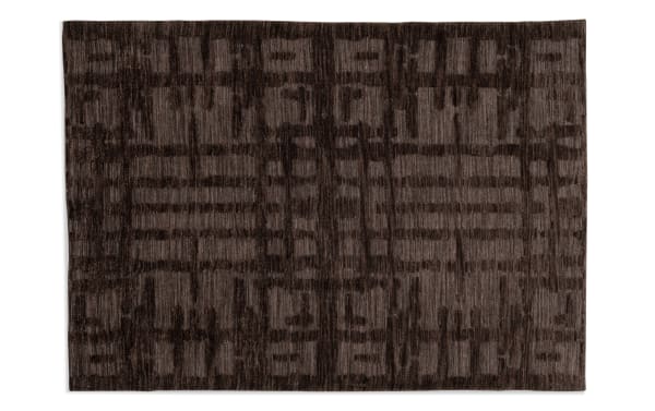 Felix 5' x 7' brown abstract rug with transitional style, made of soft polyester fabric featuring a textured geometric pattern and memory foam backing for comfort.