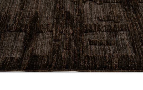 Felix 5' x 7' Brown Abstract Rug with plush polyester fabric and Bob-O-Pedic Memory Foam, featuring a textured transitional design in rich brown tones.