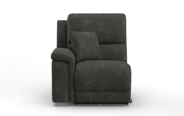Dark gray fabric upholstered sectional sofa corner piece with padded armrest and matching throw pillow, modern living room furniture.