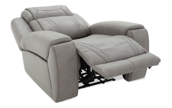 Dynamic Gray Leather Power Recliner from the Dynamic collection, featuring gray leather upholstery, transitional style, power reclining, and an extended footrest.