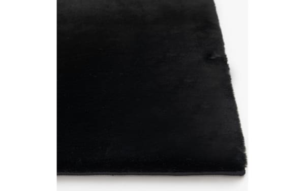 Black Angora 8' x 10' transitional rug with plush high pile polyester fabric and cushioned Bob-O-Pedic memory foam backing for comfort.