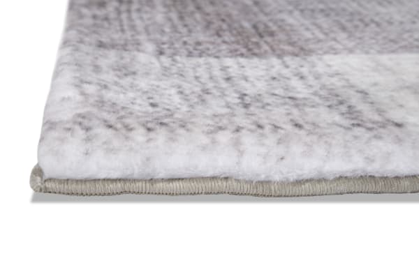 Beige plaid Cottage Check Angora 5' x 7' transitional rug with soft polyester fabric and plush charcoal Bob-O-Pedic memory foam backing.