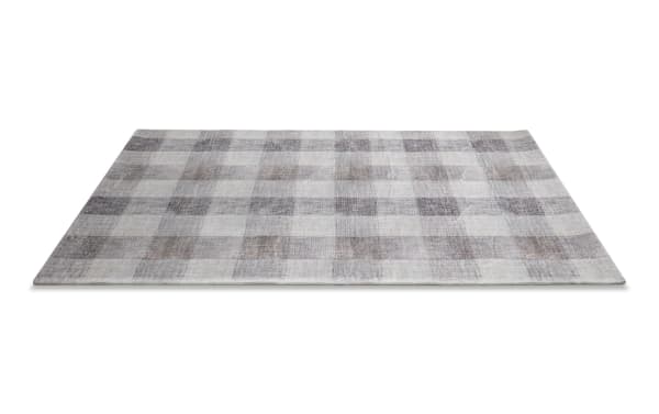 Beige plaid Cottage Check Angora 5' x 7' rug with soft polyester fabric and charcoal Bob-O-Pedic memory foam backing for cushioned comfort.