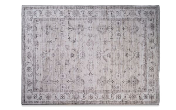 Everly 5' x 7' beige Oriental rug with transitional style, polyester fabric, charcoal-infused memory foam layer for odor neutralizing and freshness.
