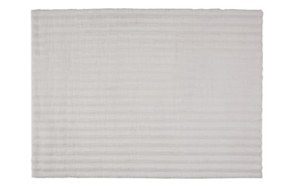 Sofia Channel 8' x 10' white solid rug with silky soft polyester fabric and cushioned Bob-O-Pedic memory foam, featuring a subtle channel pattern in transitional style.