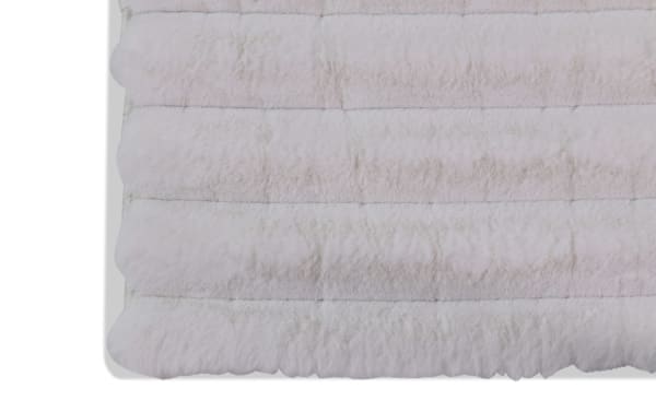 Sofia Channel 8' x 10' white solid transitional rug with plush polyester fabric and cushioned Bob-O-Pedic memory foam for soft, cozy comfort.