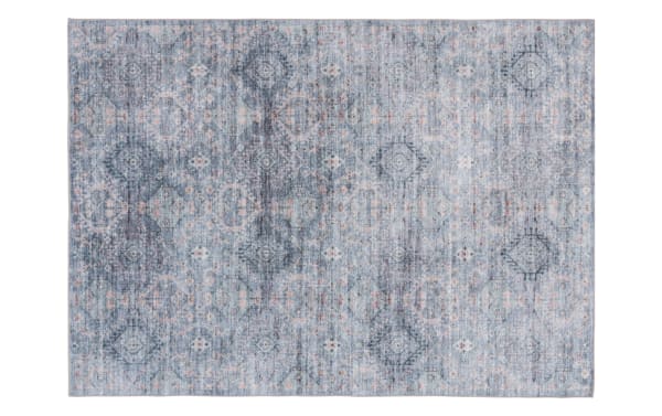 Blue and gray vintage-style area rug with faded geometric and floral patterns, soft textured fabric suitable for living room or bedroom decor.