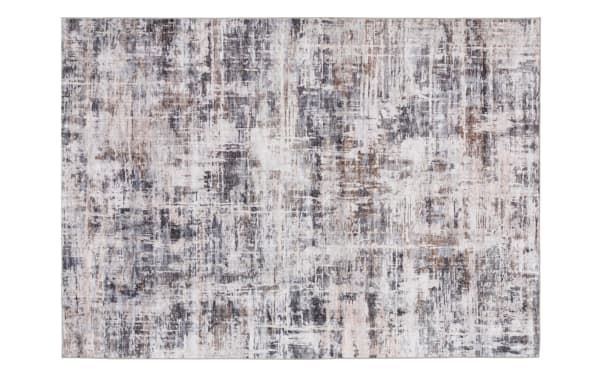 Area rug with an abstract distressed pattern in shades of gray, beige, and white, featuring a modern, textured design ideal for contemporary home decor.