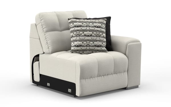 Modern beige fabric armchair with tufted cushions, square armrest, and two decorative pillows in black and patterned gray.