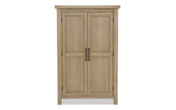 Wooden wardrobe with natural light oak finish, two paneled doors, and dark metal vertical handles, ideal for bedroom storage.